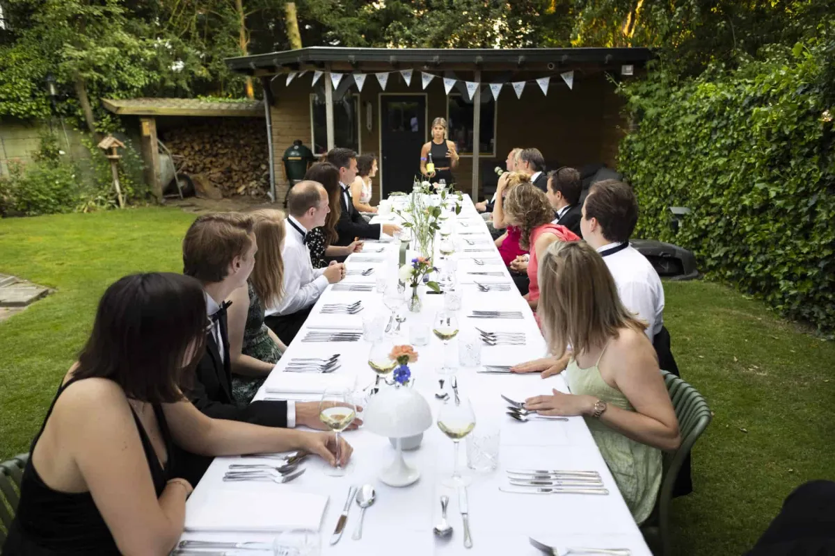 Long set table in the garden during a BBakker Culinair dinner